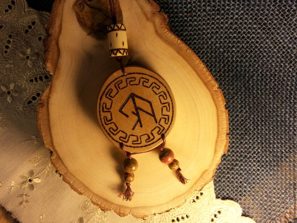 amulet with a rune happily photo 1